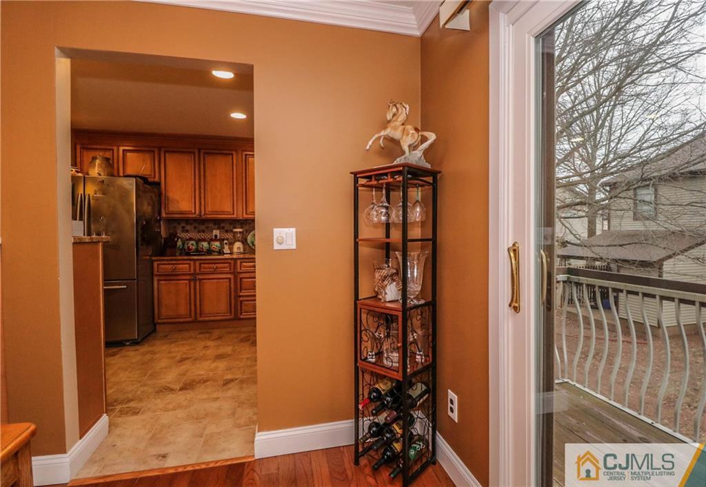 7307 Hana Road Edison, NJ 08817 - Photo 6 of 24 a kitchen with stainless steel appliances a refrigerator and a stove