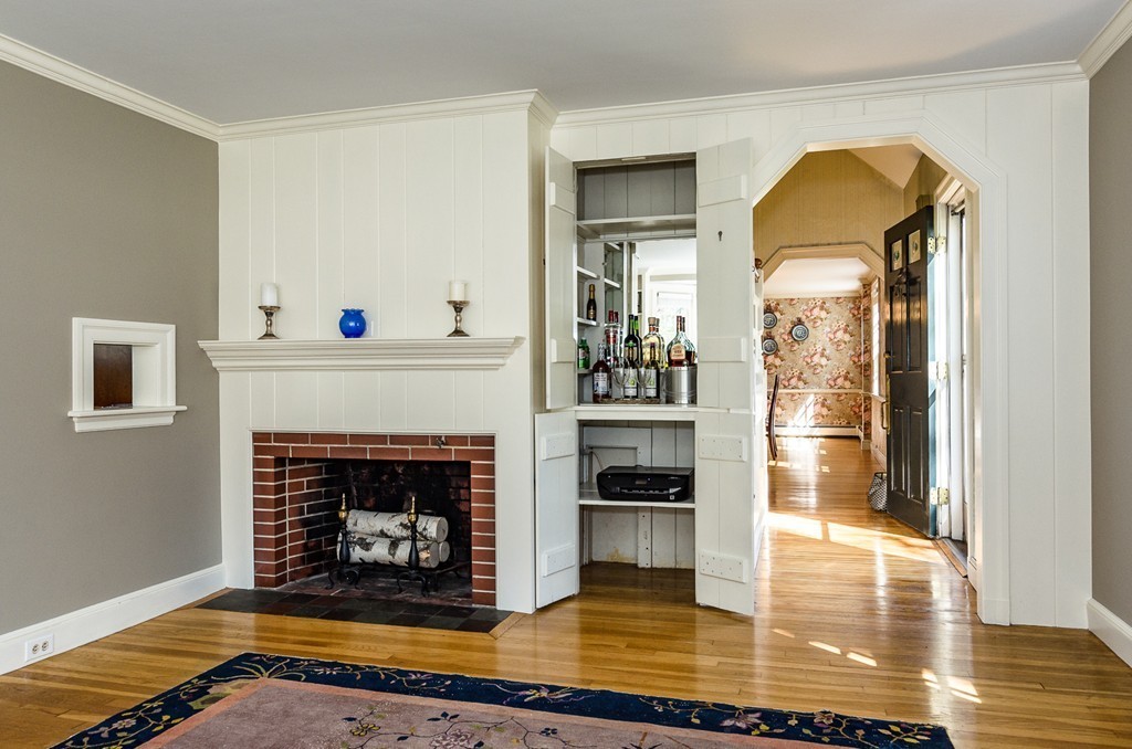 68 Old Farm Road Newton, MA 02459 - Photo 4 of 23 a living room with furniture and a fireplace