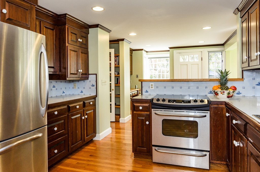 68 Old Farm Road Newton, MA 02459 - Photo 7 of 23 a kitchen with stainless steel appliances granite countertop a stove a refrigerator and a refrigerator