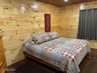 138 Mathews Road Oneida, TN 37841 - Photo 15 of 31 a bedroom with a bed and a shower