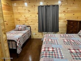 138 Mathews Road Oneida, TN 37841 - Photo 17 of 31 a bedroom with a bed and a dresser