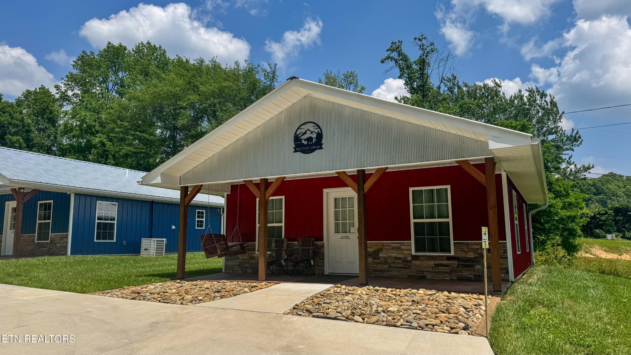 138 Mathews Road Oneida, TN 37841 - Photo 20 of 31 a view of a house with a yard and plants