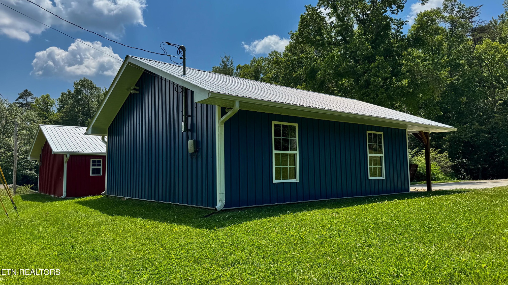 138 Mathews Road Oneida, TN 37841 - Photo 27 of 31 a view of a house with a backyard