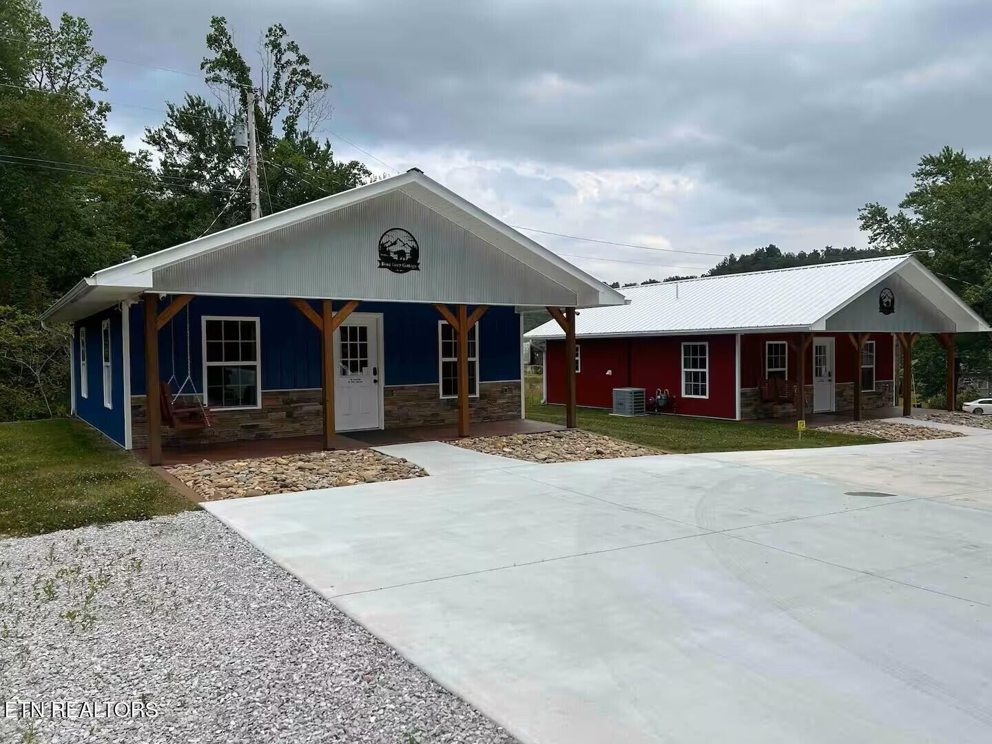 138 Mathews Road Oneida, TN 37841 - Photo 3 of 31 a front view of a house with a yard and garage