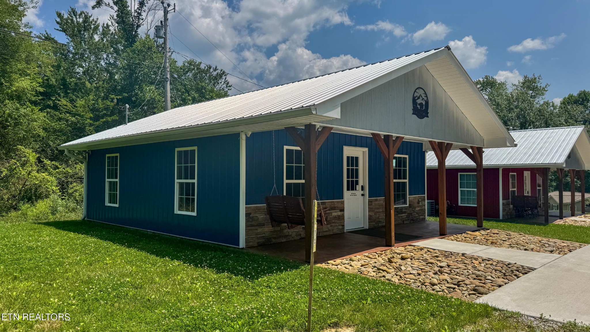 138 Mathews Road Oneida, TN 37841 - Photo 31 of 31 a view of a house with a yard plants and large tree