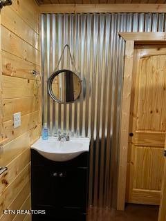 138 Mathews Road Oneida, TN 37841 - Photo 10 of 31 a bathroom with a sink a mirror and a shower