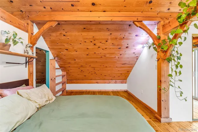 a view of entryway with wooden floor