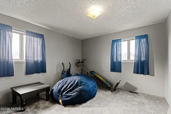 a room with furniture and a window