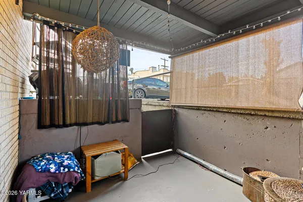 a room with furniture and a chandelier