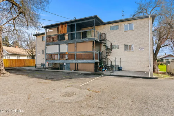 a view of a house with a street