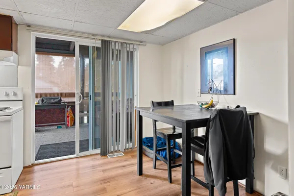 a view of a dining room with furniture