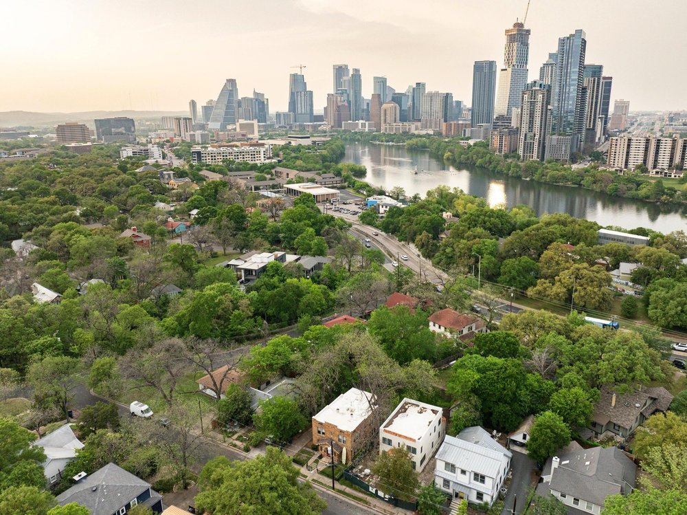 a view of a city with tall buildings