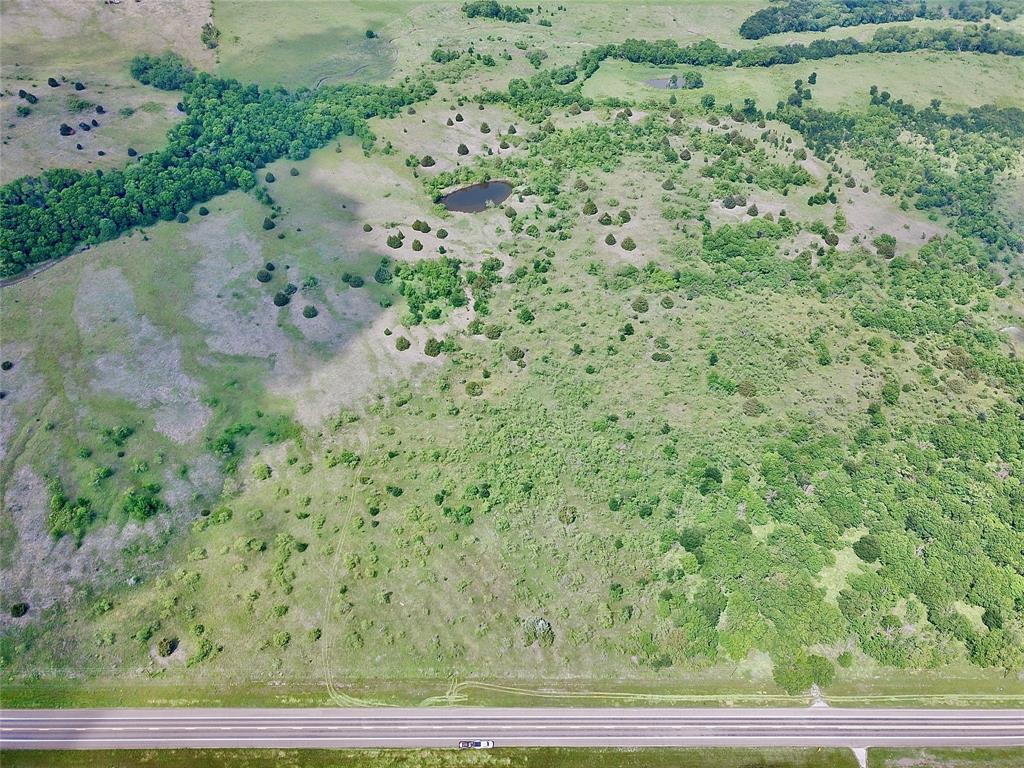 1 Fm 85 Ennis, TX 75119 - Photo 8 of 39 a view of a yard with a wooden fence