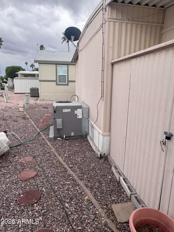 a bathroom with a sink a toilet and shower curtain