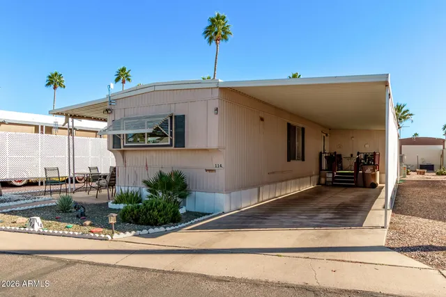 a view of a living room and entryway