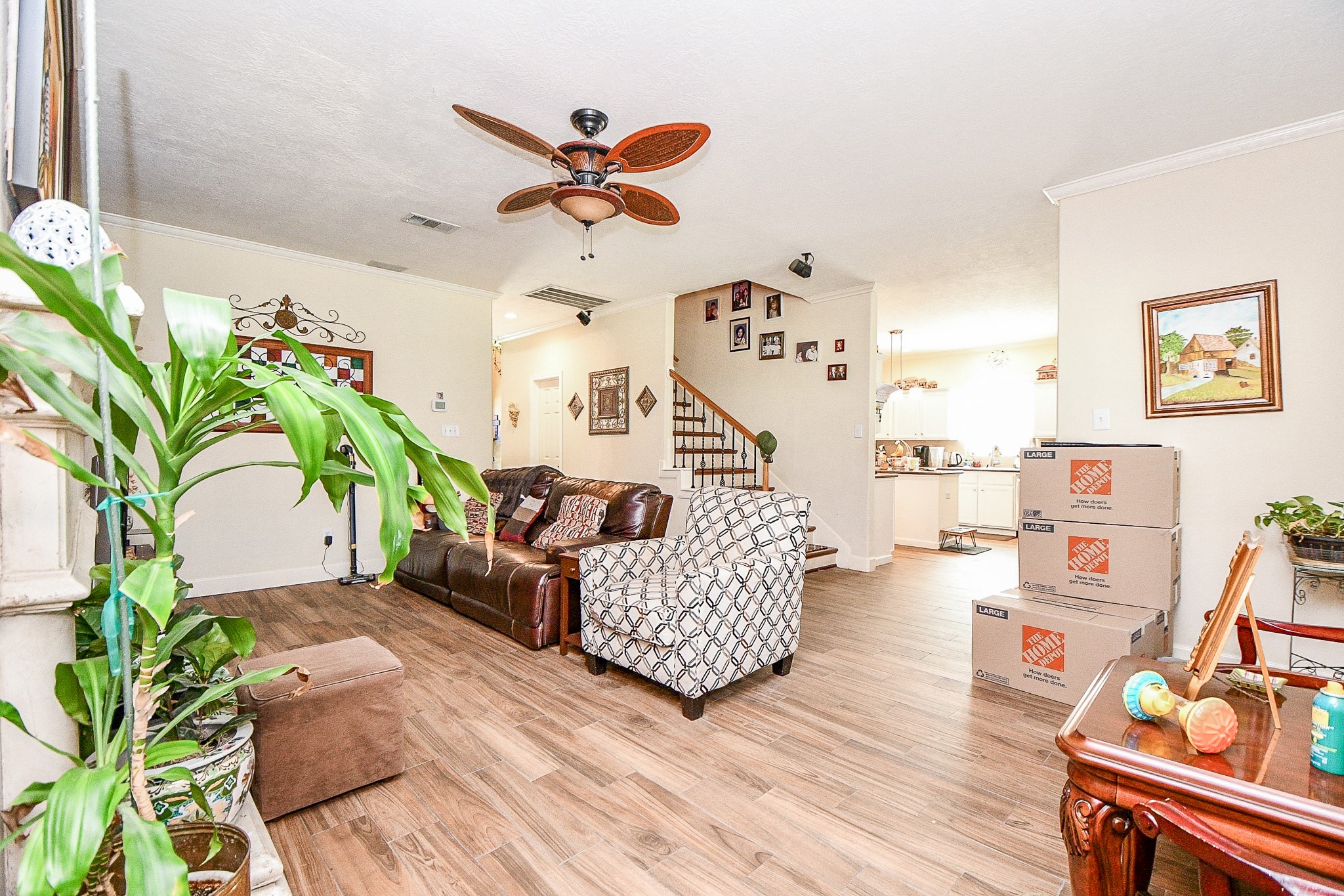 2910 Clayton Ridge Court Houston, TX 77082 - Photo 15 of 32 a living room with furniture and a potted plant