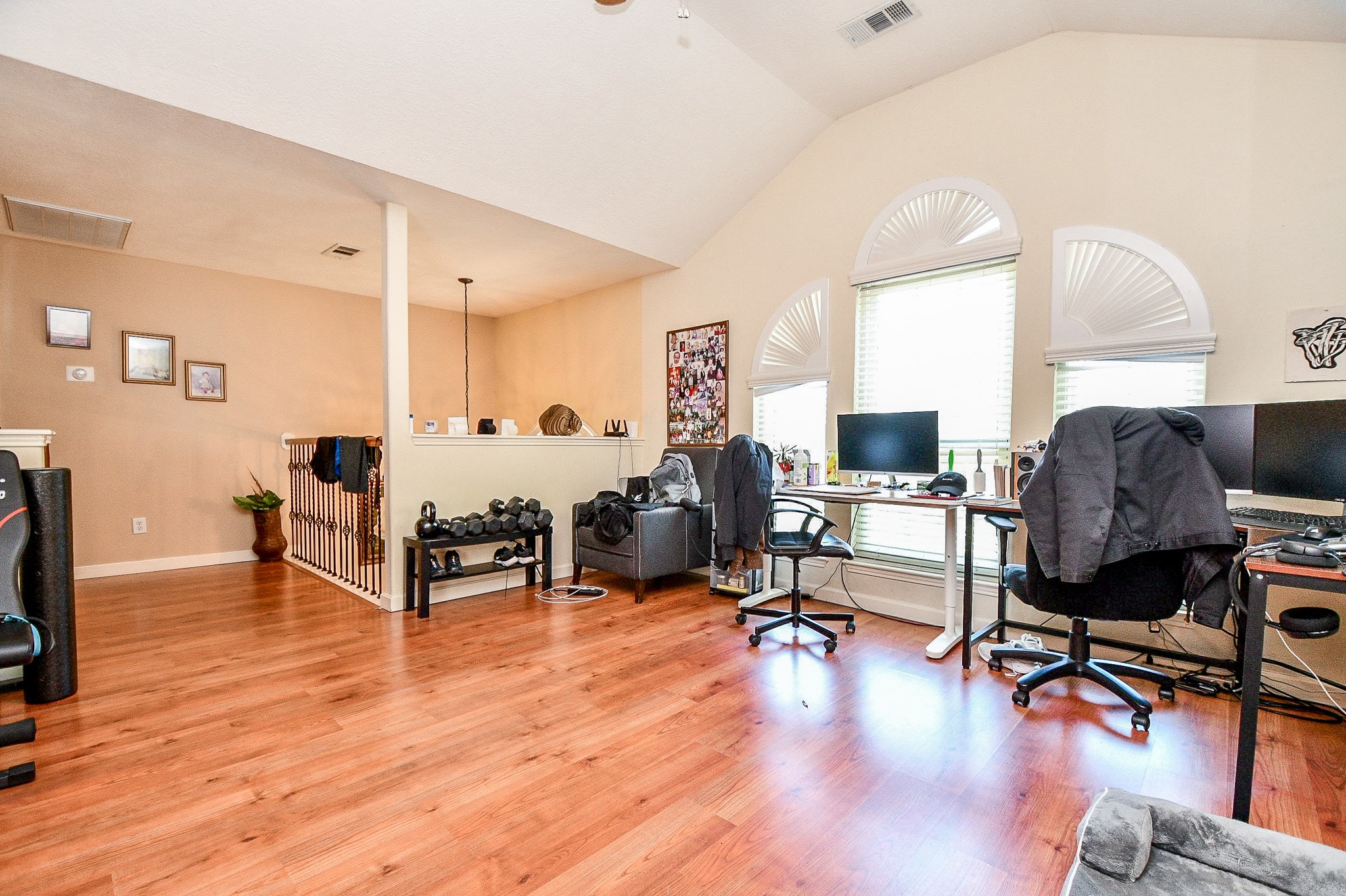 2910 Clayton Ridge Court Houston, TX 77082 - Photo 23 of 32 a living room with furniture and a wooden floor