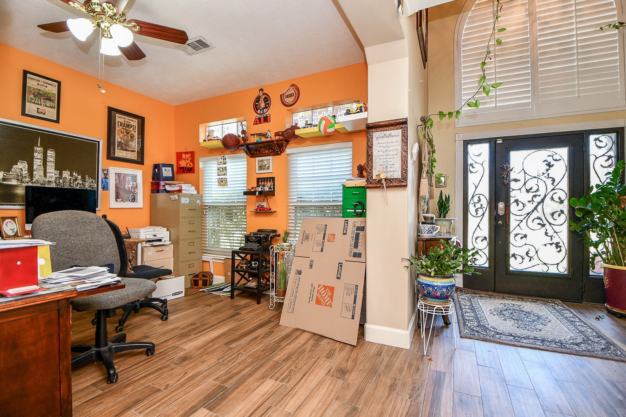 2910 Clayton Ridge Court Houston, TX 77082 - Photo 7 of 32 a workspace with furniture window and wooden floor