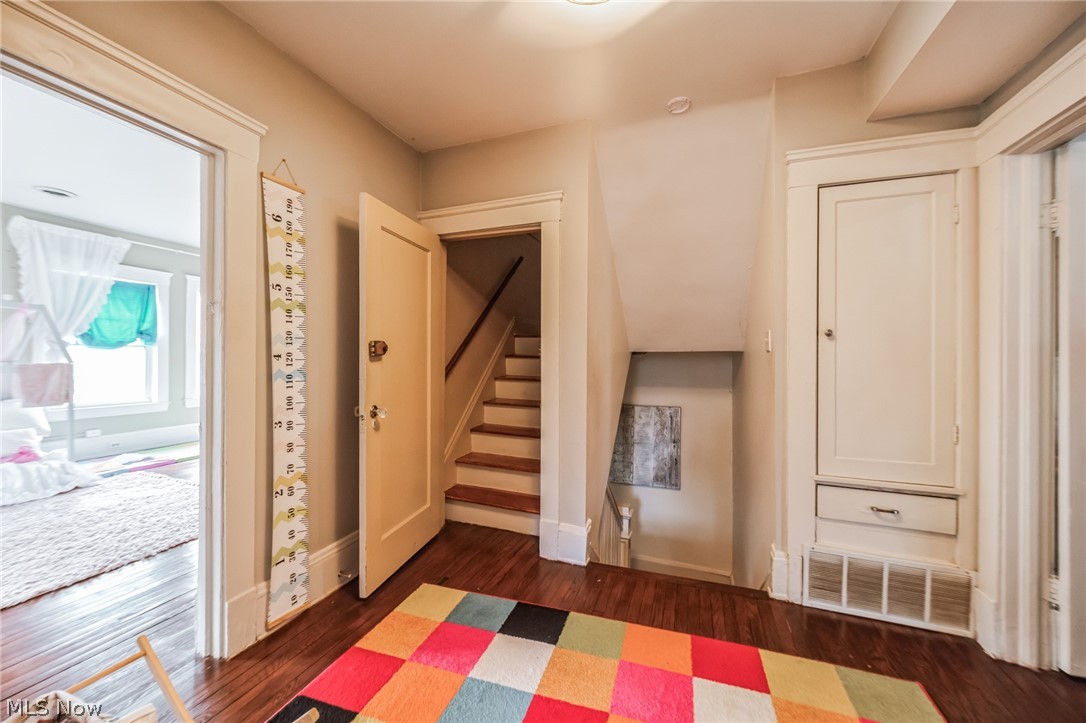 14432 Superior Road Cleveland, OH 44118 - Photo 8 of 24 Entrance foyer featuring dark hardwood / wood-style floors