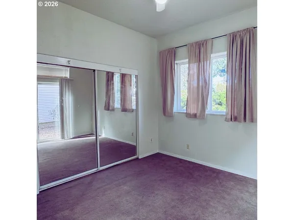 a view of an empty room with window