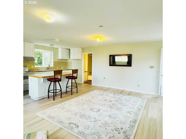 a view of a dining room with furniture