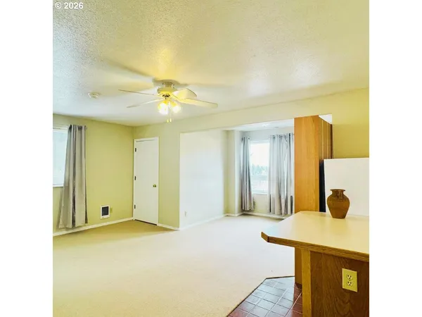a bathroom with a sink a mirror and shower