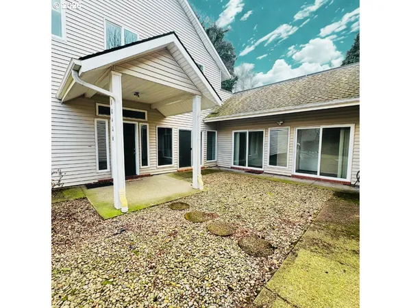 a view of a house with a swimming pool