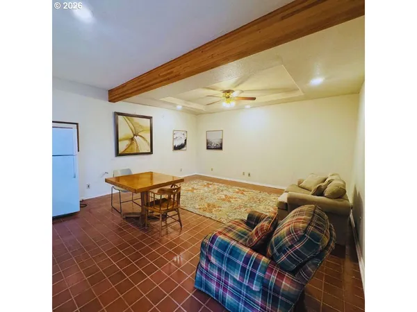 a living room with furniture and a table
