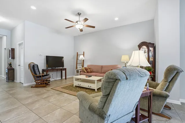 a bathroom with a bathtub a shower and a sink