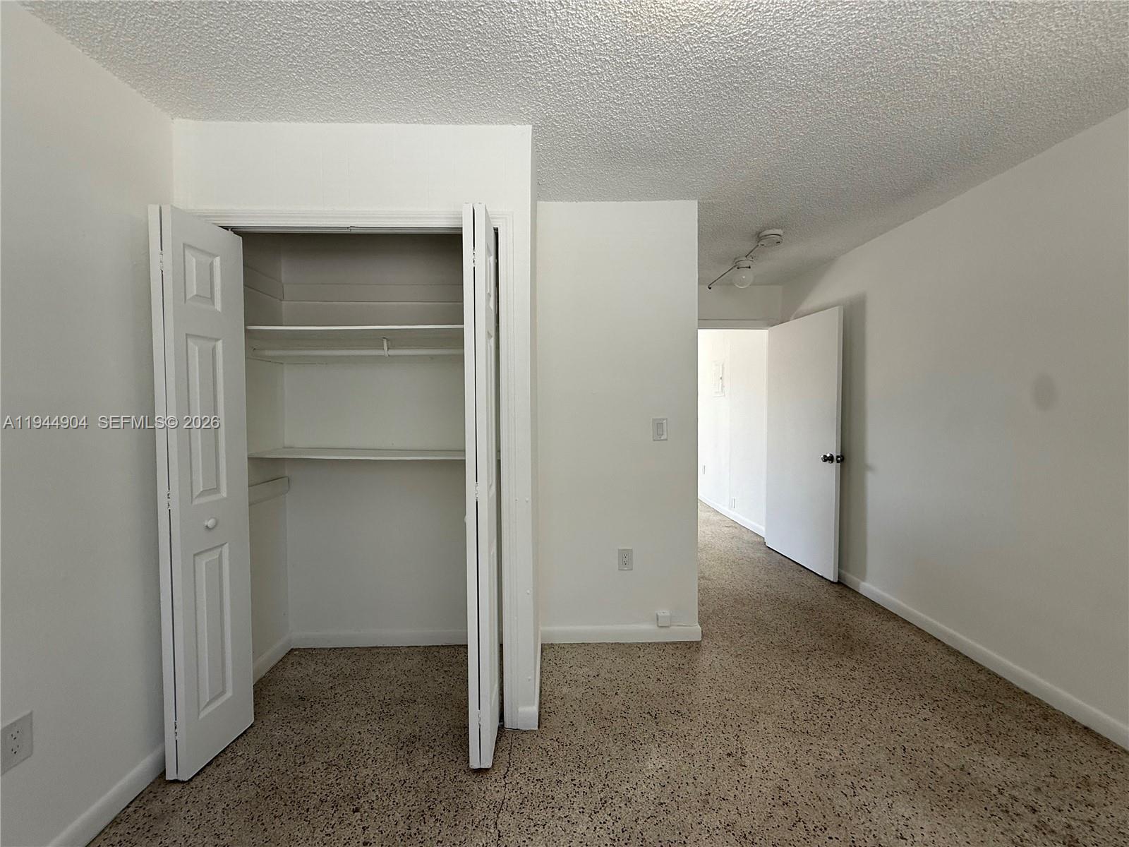 59 West 26th Street, Unit 6 Hialeah, FL 33010 - Photo 5 of 6 a view of an empty room