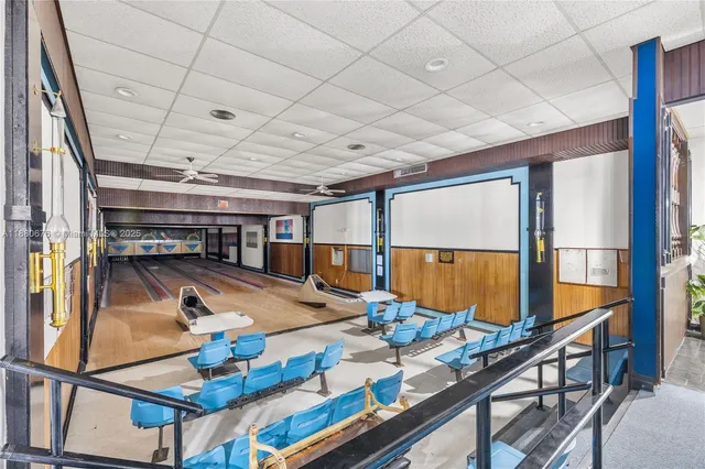 a view of room with furniture and book shelf