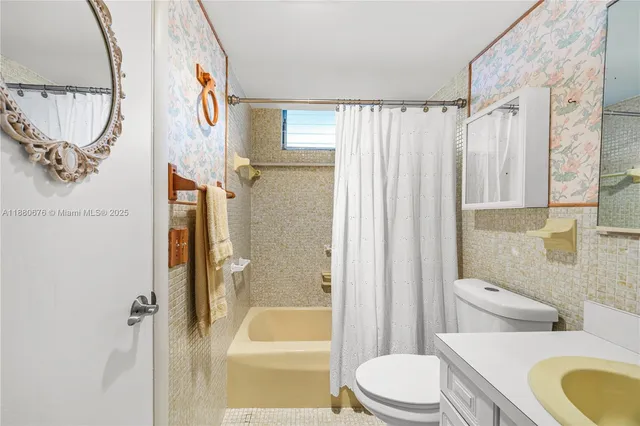 a view of city with tall buildings