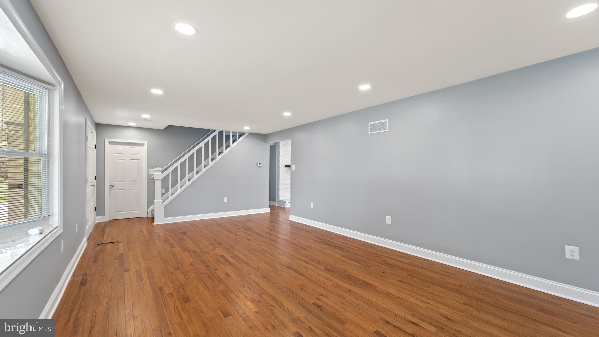 3605 Chapman Road Randallstown, MD 21133 - Photo 20 of 65 wooden floor in an empty room with a window