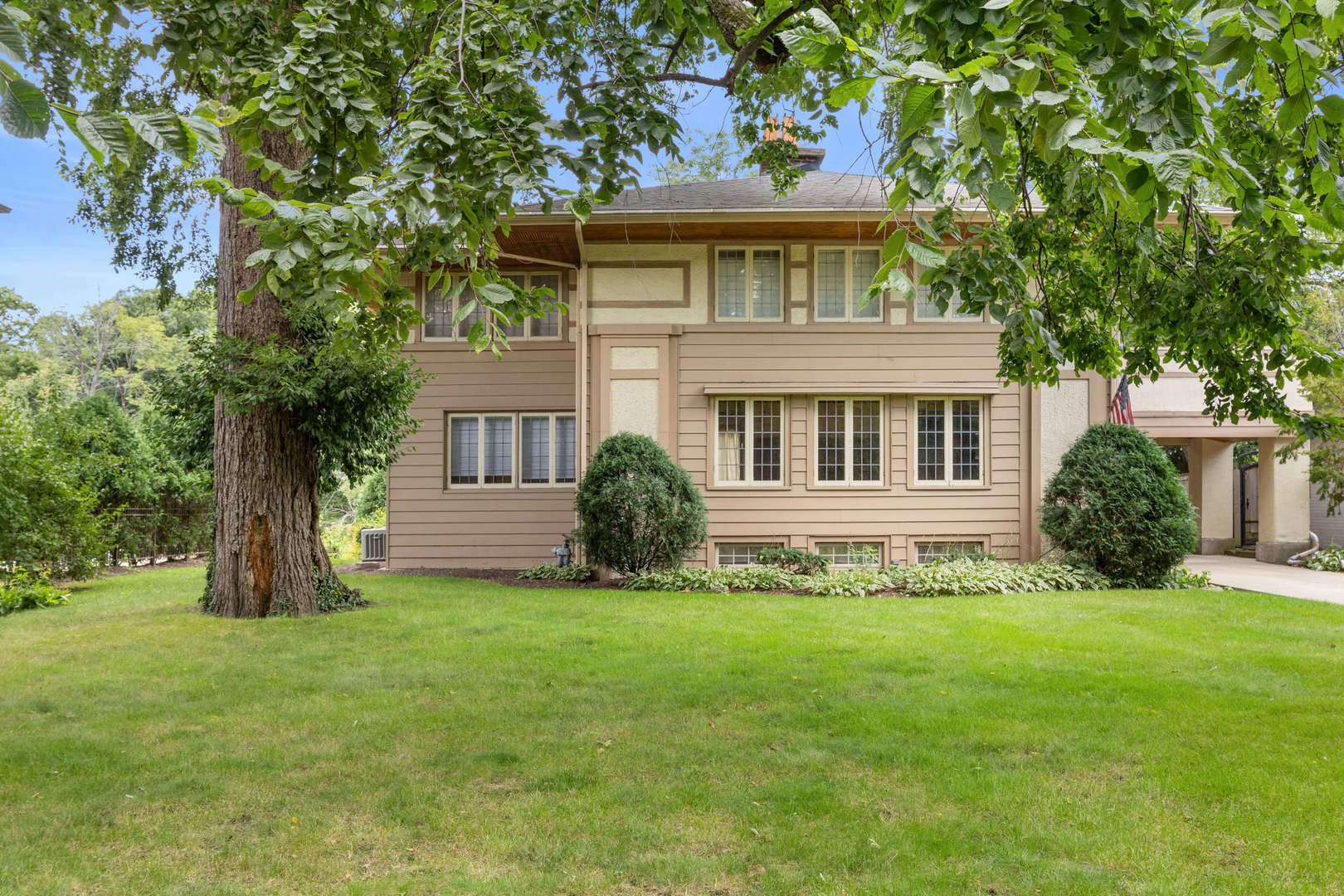 260 Maplewood Road Riverside, IL 60546 - Photo 1 of 48 a front view of a house with a yard