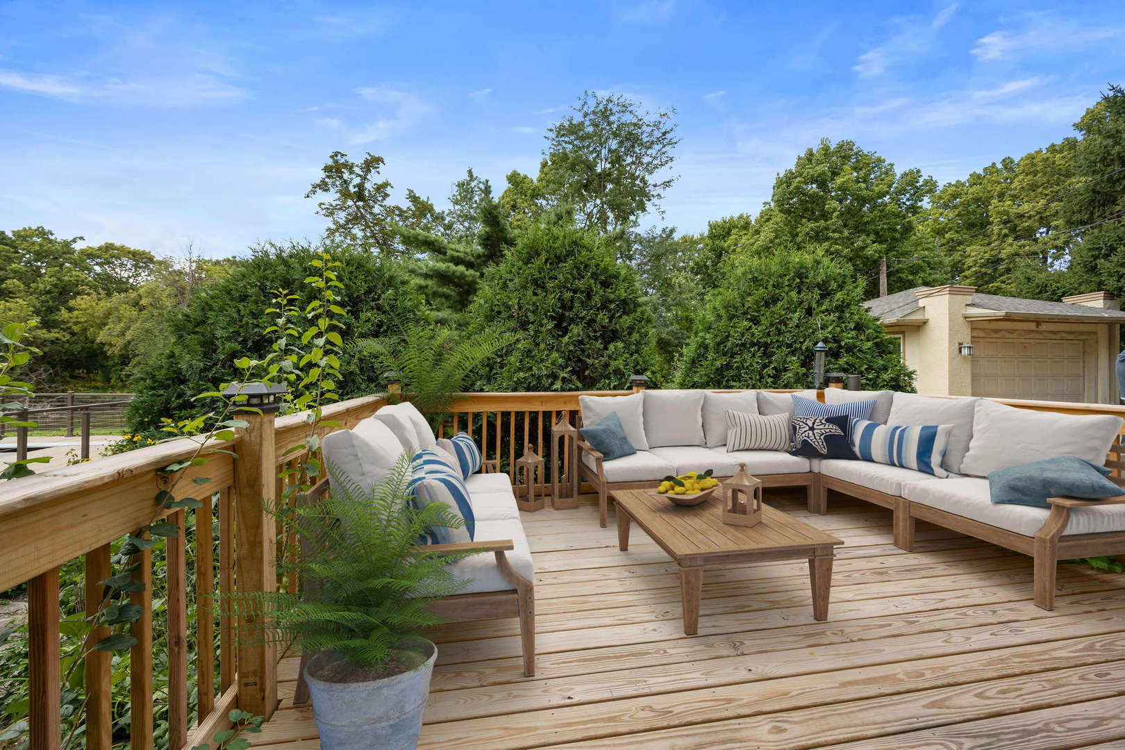 260 Maplewood Road Riverside, IL 60546 - Photo 11 of 48 a balcony with wooden floor and outdoor seating