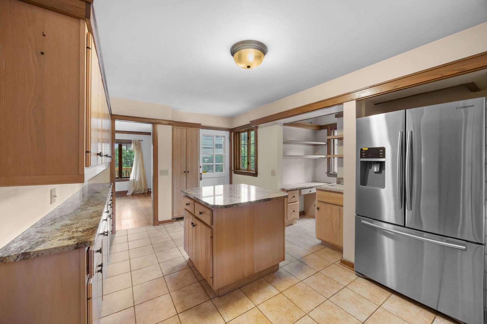 260 Maplewood Road Riverside, IL 60546 - Photo 15 of 48 a kitchen with stainless steel appliances granite countertop a refrigerator and a stove