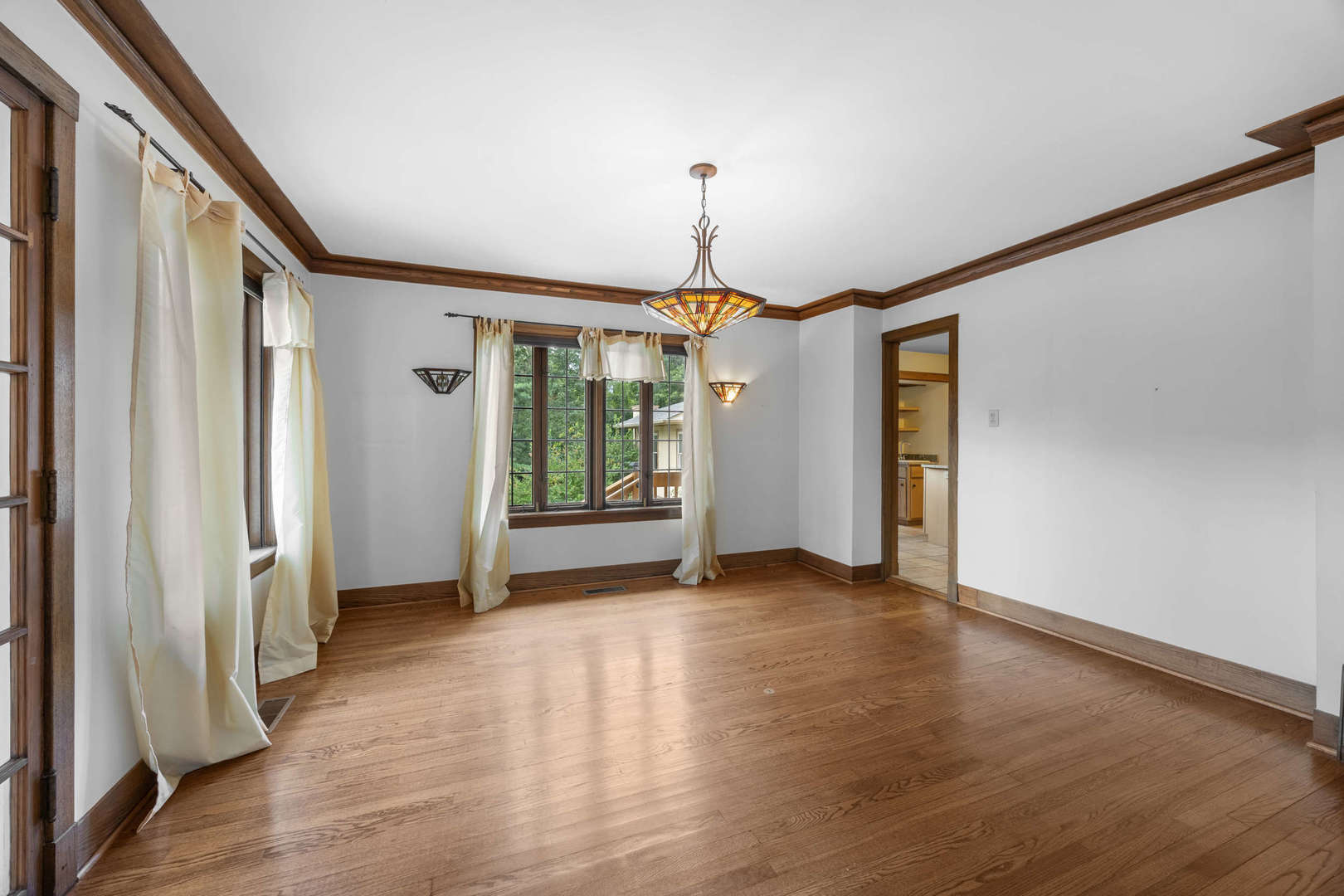260 Maplewood Road Riverside, IL 60546 - Photo 18 of 48 a view of empty room with wooden floor and fan