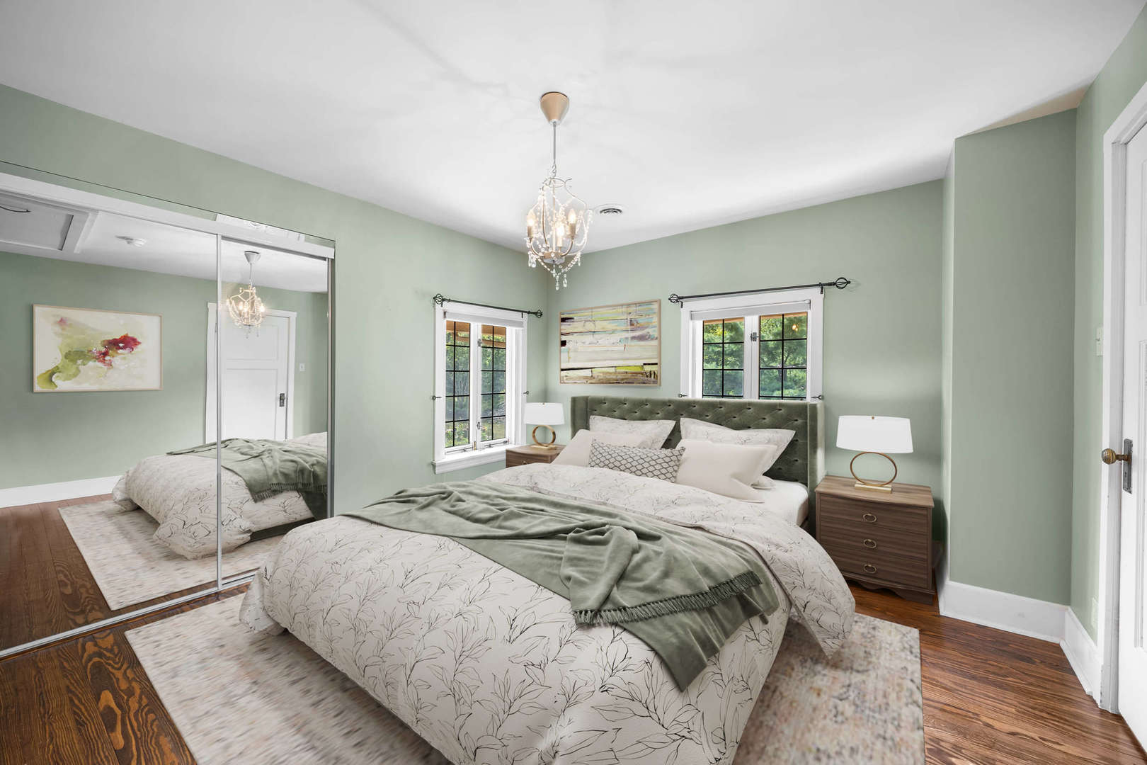 260 Maplewood Road Riverside, IL 60546 - Photo 26 of 48 a bedroom with a large bed and a chandelier