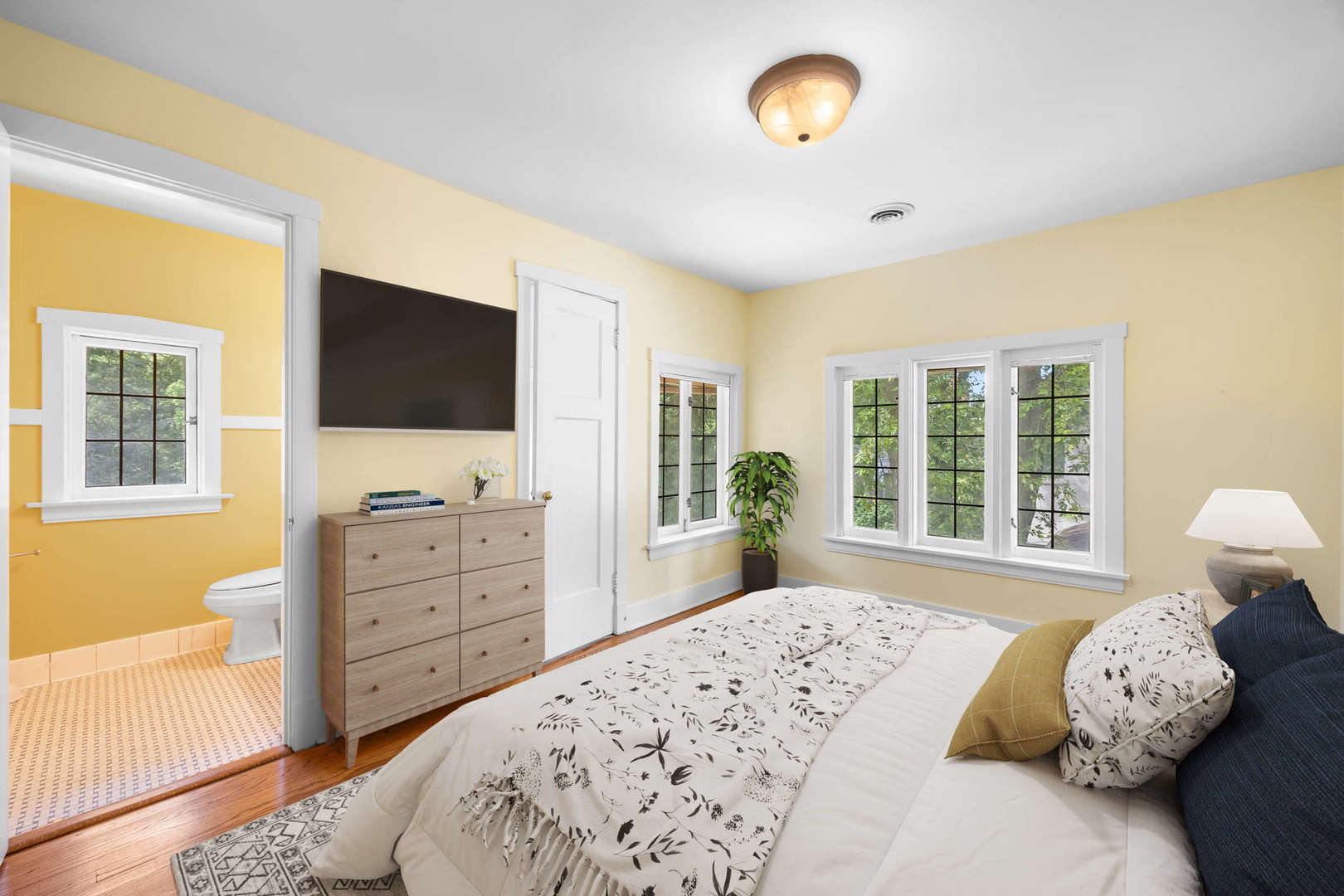 260 Maplewood Road Riverside, IL 60546 - Photo 30 of 48 a bedroom with a bed and flat screen tv