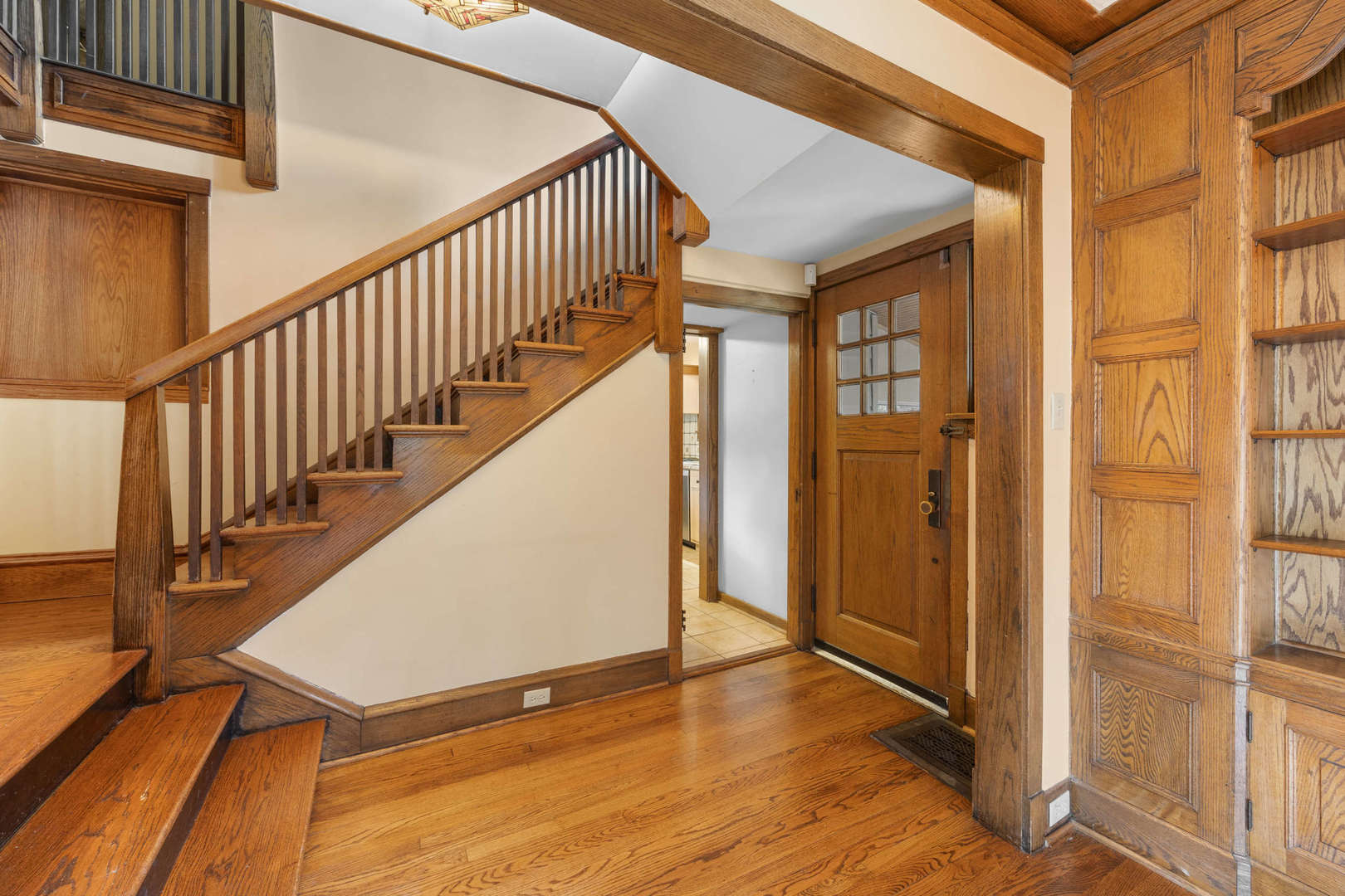 260 Maplewood Road Riverside, IL 60546 - Photo 40 of 48 a view of a hallway with wooden floor and staircase