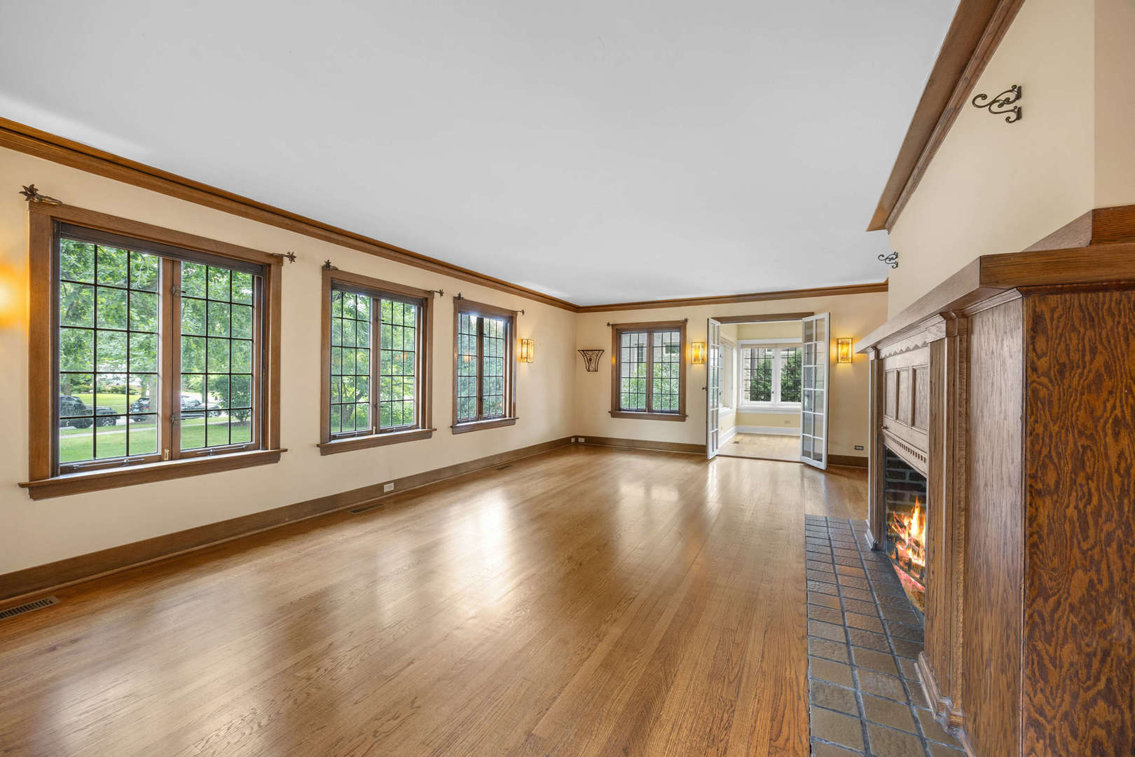 260 Maplewood Road Riverside, IL 60546 - Photo 7 of 48 a view of empty room with wooden floor and fan