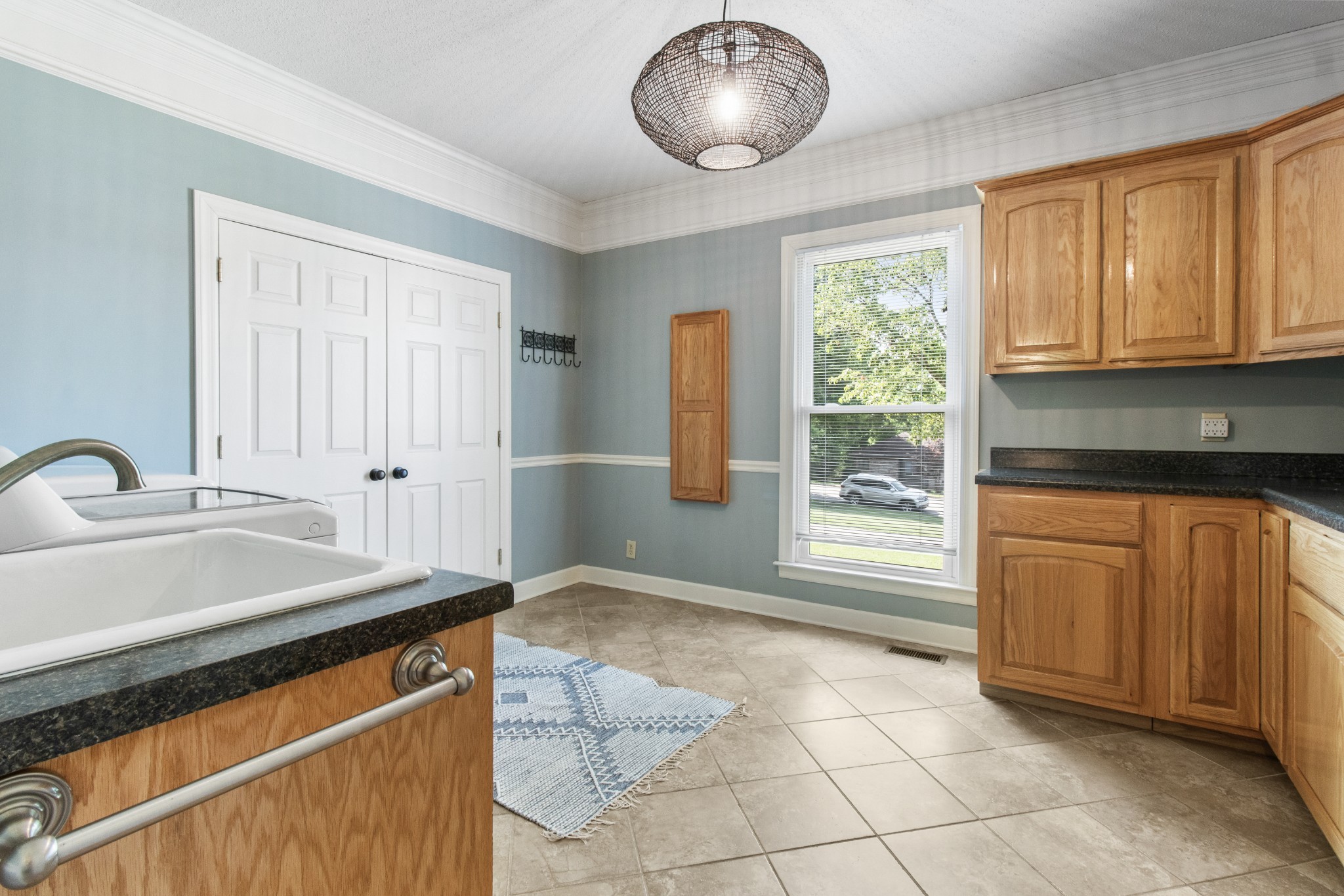 2203 Springlot Road Clarksville, TN 37043 - Photo 15 of 36 a kitchen with stainless steel appliances granite countertop a sink and cabinets