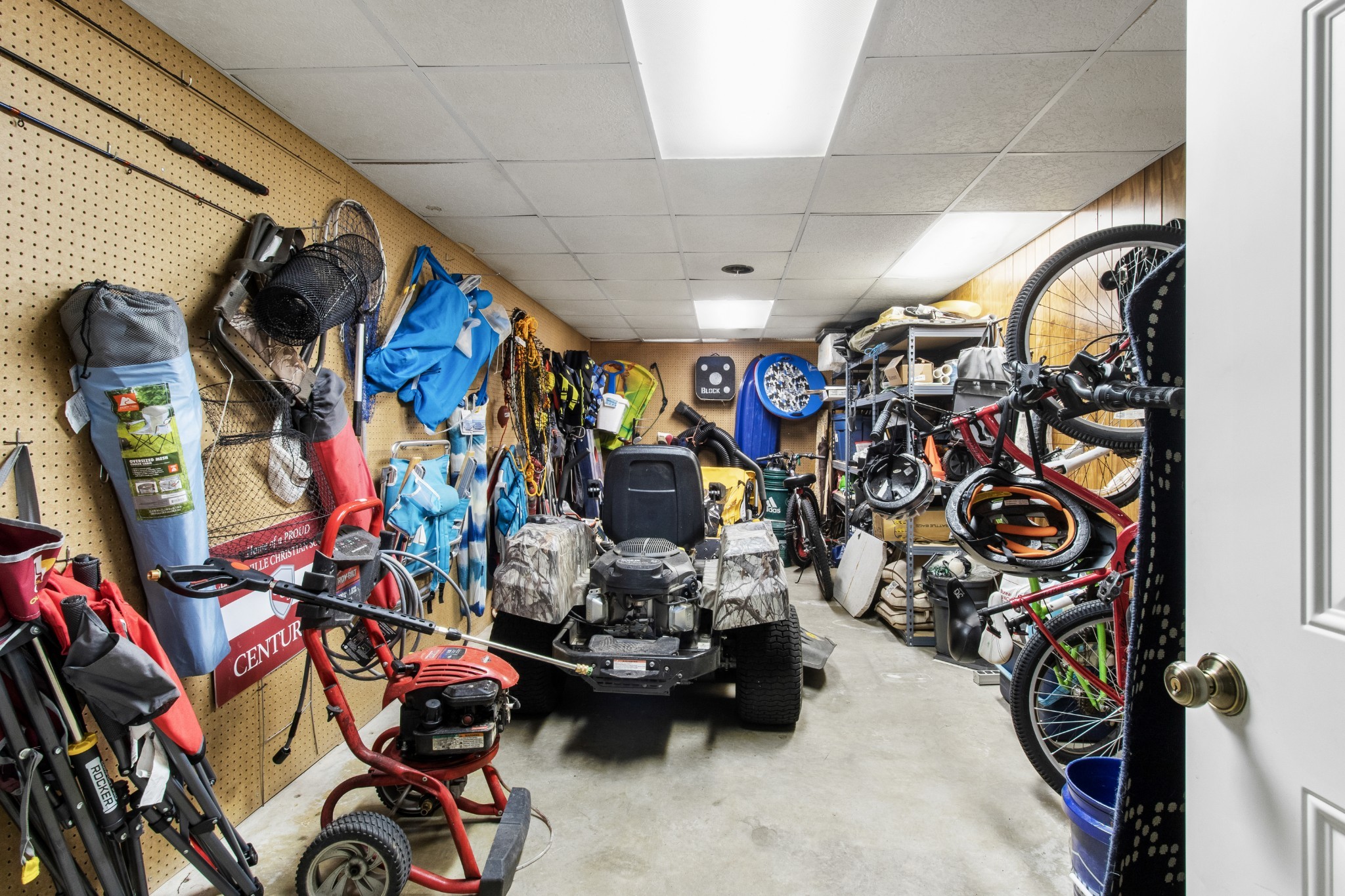 2203 Springlot Road Clarksville, TN 37043 - Photo 32 of 36 a view of a storage room with lots of stuff