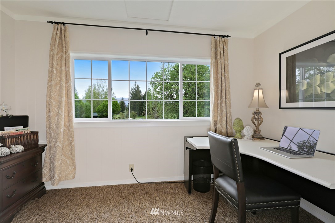4440 Preston-Fall City Road Southeast Fall City, WA 98024 - Photo 15 of 38 a view of a workspace with furniture and a window