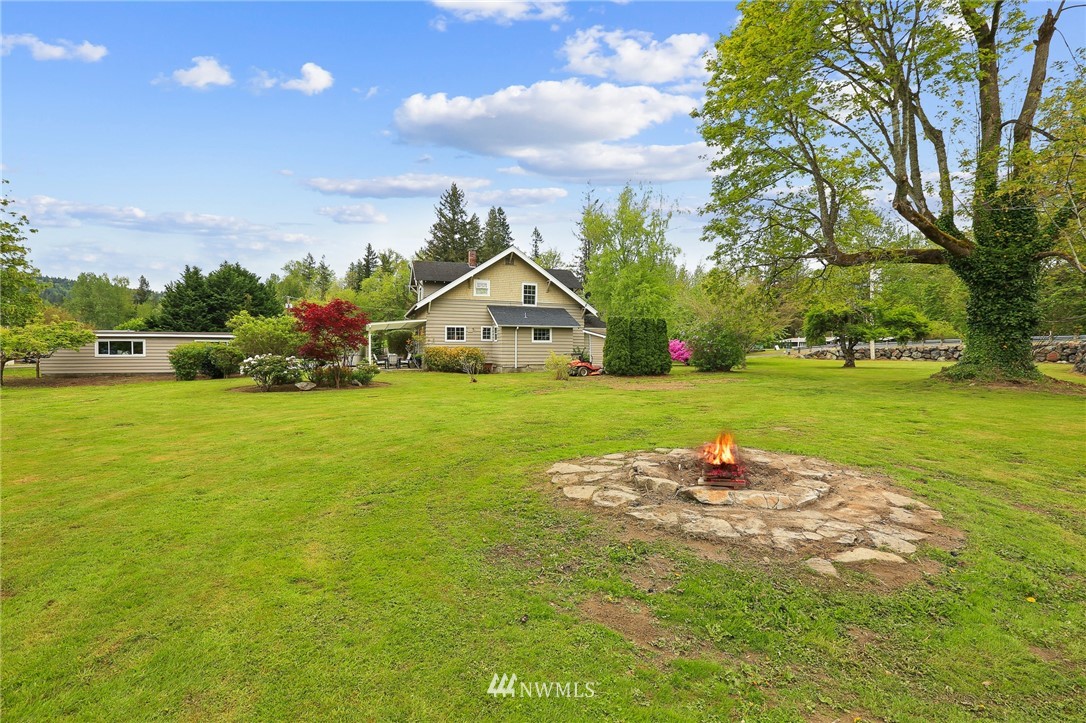 4440 Preston-Fall City Road Southeast Fall City, WA 98024 - Photo 24 of 38 a view of a house with yard and green space