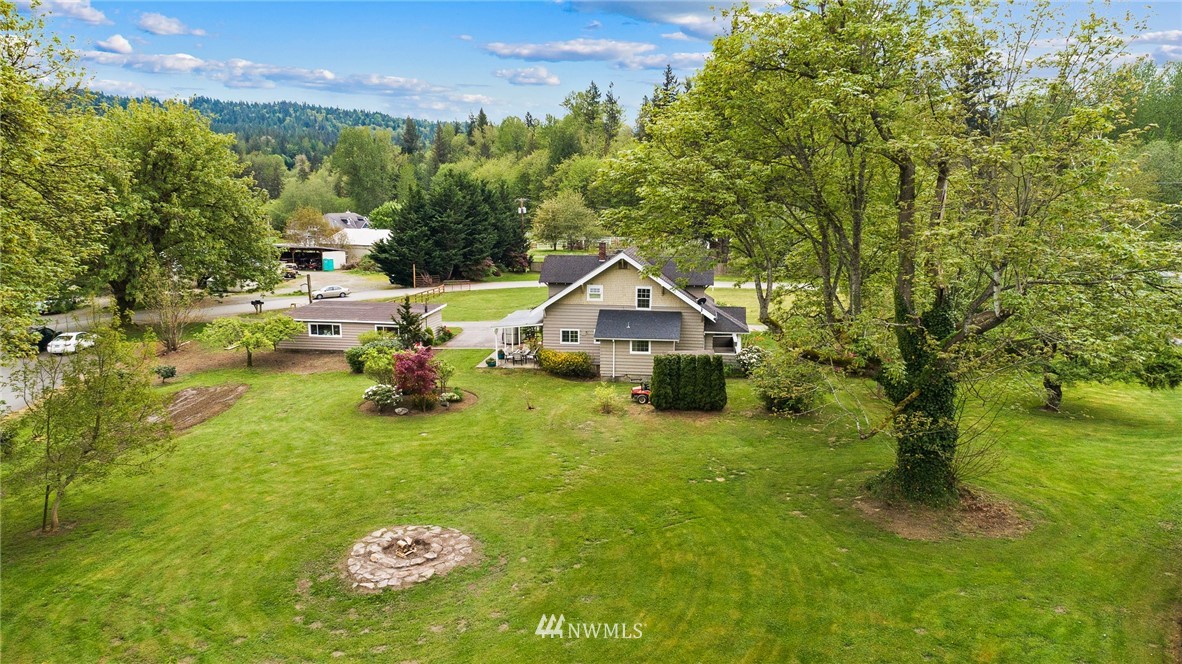 4440 Preston-Fall City Road Southeast Fall City, WA 98024 - Photo 25 of 38 a view of a house with a yard