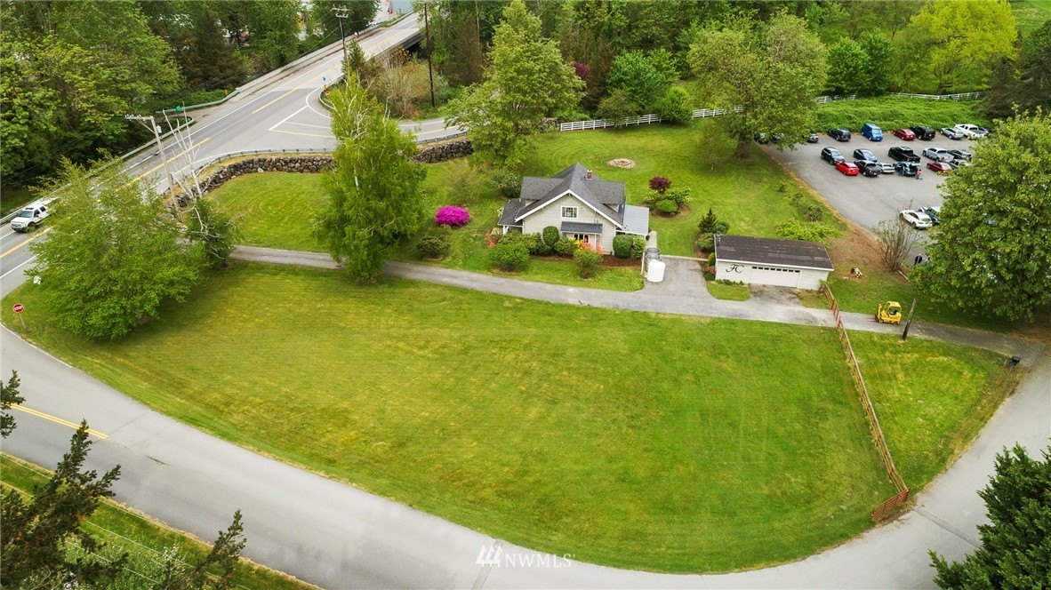 4440 Preston-Fall City Road Southeast Fall City, WA 98024 - Photo 27 of 38 a view of a swimming pool with a yard and seating area