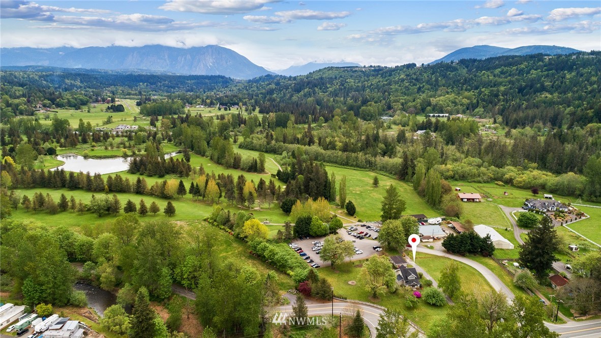 4440 Preston-Fall City Road Southeast Fall City, WA 98024 - Photo 30 of 38 a view of a city with mountains in the background