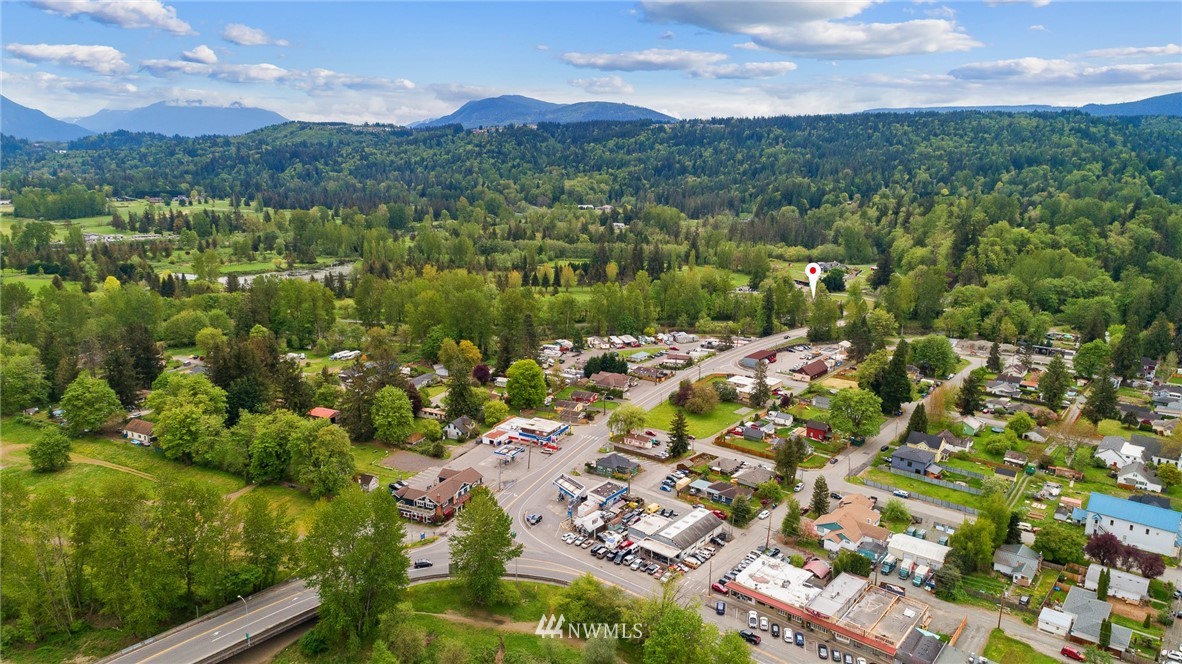 4440 Preston-Fall City Road Southeast Fall City, WA 98024 - Photo 32 of 38 a view of a city with mountains in the background