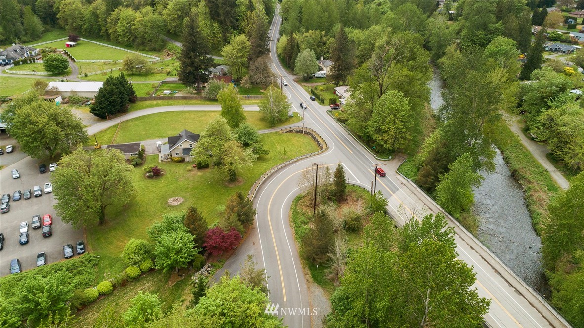 4440 Preston-Fall City Road Southeast Fall City, WA 98024 - Photo 33 of 38 an aerial view of lake residential house with outdoor space and trees